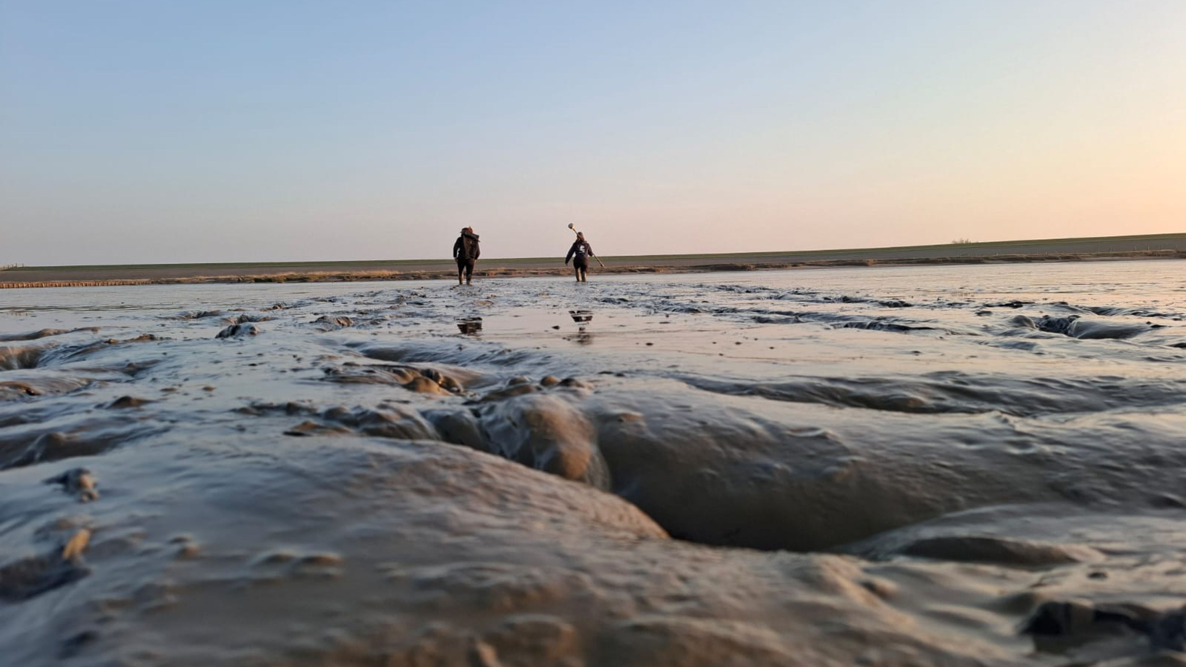Two people mudwalking